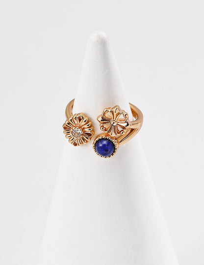 QL-J0325-2 Lapis Lazuli Daisy Zircon Ring. The deep blue lapis lazuli resembles the midsummer sky, while the vintage cross pattern evokes French elegance.