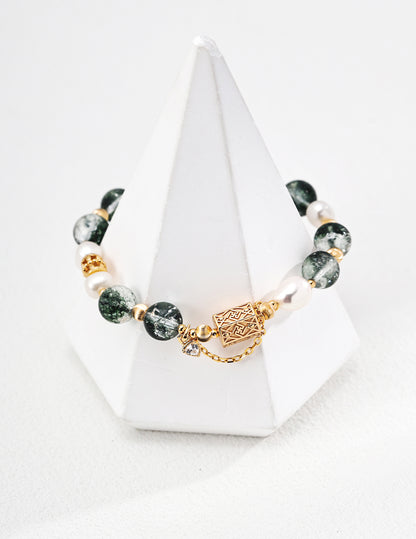 QL-SL0243-2  Graceful willows swaying, with rippling reflections by the West Lake. The fresh pearls are like white lotus flowers blooming in midsummer, floating upon the lake. The ethereal crystal is just like that